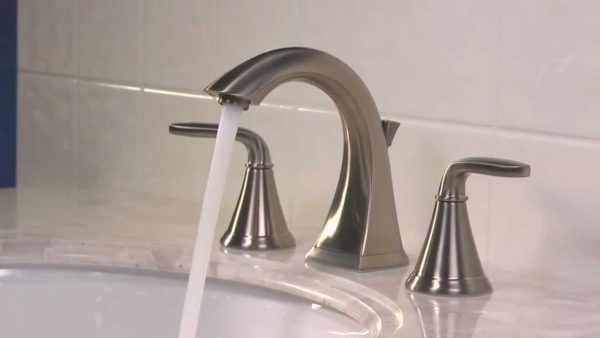 Brushed nickel faucet with water turned on